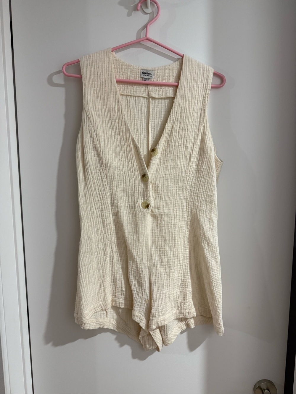 Rhythm Cream Textured Sleeveless Romper with Button Front